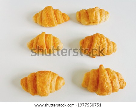 Croissant​s​ are​ common​ly​ eaten​ for​ breakfast​ with​ coffee​ or​ tea​ the​ main​ ingredient​s​ are​ bread​ flour, milk, sugar, yeast, salt, water, butter​ Stock fotó © 