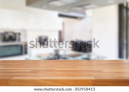 Empty wooden table and blurred kitchen background, product  montage display