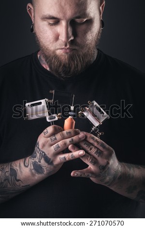 Man tattoo artist