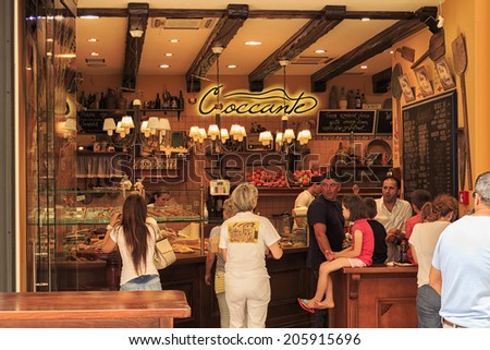 ZADAR, CROATIA - JULY 15, 2014: Tourists resting and eating in one of Zadar fast food restaurants