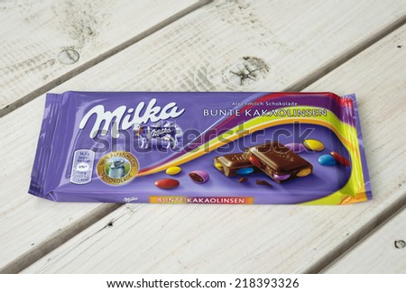 ZAGREB, CROATIA - SEPTEMBER 20, 2014: Milka with chocolate drops. Milka chocolate on white board background