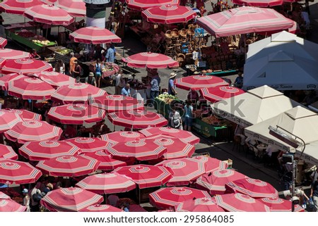 ZAGREB, CROATIA - JULY 11, 2015: Customers and sellers at Dolac, the famous open air farmer\'s market of agricultural products in Zagreb, one of city\'s most notable landmarks.