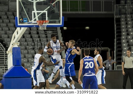 ZAGREB, CROATIA - AUGUST 27, 2015: The preparatory match ahead of the EuroBasket 2015 between Israel and Estonia. Israeli basketball player Shawn Dawson in the air, holding the ball in his hands