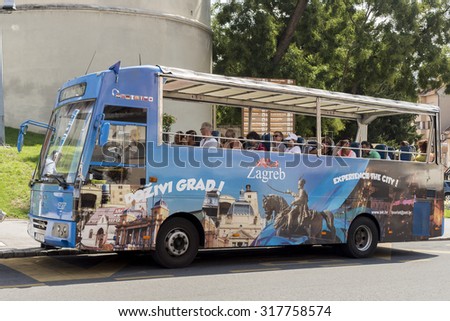 ZAGREB, CROATIA - AUGUST 26, 2015: Hop on, hop off bus in city of Zagreb, very popular with tourists