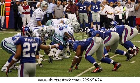 DALLAS, TEXAS - DECEMBER 14, 2008: Tony Romo and the Dallas Cowboys line up against the NY Giants in the Texas Stadium.