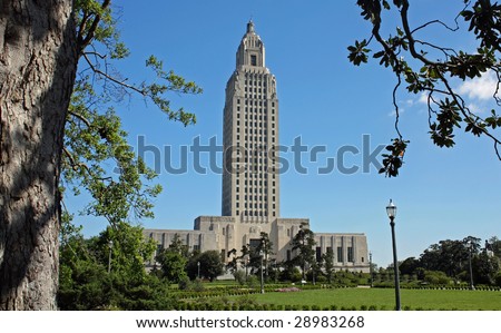 Louisiana State Capital building viewed through trees. Tallest state capital in the USA.
