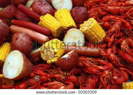 Boiled crawfish with corn, potatoes and hot dogs.