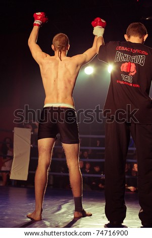 SEVASTOPOL, UKRAINE - 03 APRIL: Winner Bazhenov Dmitriy at Ukrainian championship MIX FIGHT, April 03, 2011 in Sevastopol, Ukraine.