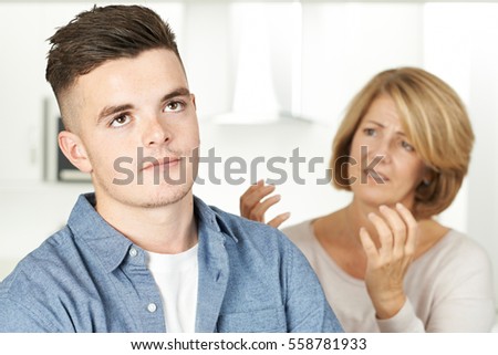 Similar – Image, Stock Photo Mother and son crossing a bridge together