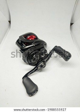 Bait Casting Reel, usually for fishing predator fish such as bass, toman, etc Imagine de stoc © 