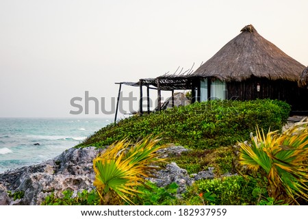 Huts with minimalism in mind on a beach in the Riviera Maya.