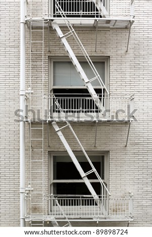 Similar – Foto Bild Fensterln- und Feuerleiterln in Manhattan