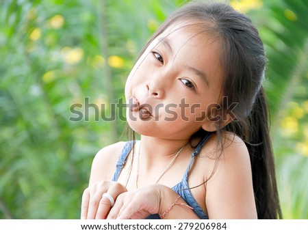 Young Cute Girl With Cookies In Mouth Look Like Rabbit Stock Photo ...