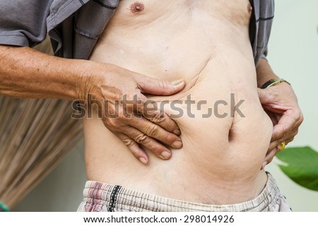 A sloppy old fat white guy wearing a stained wife beater t-shirt and -  Stock Image - Everypixel