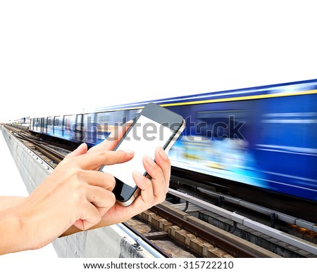 woman hand hold and touch screen on smartphone on the speed train in background .