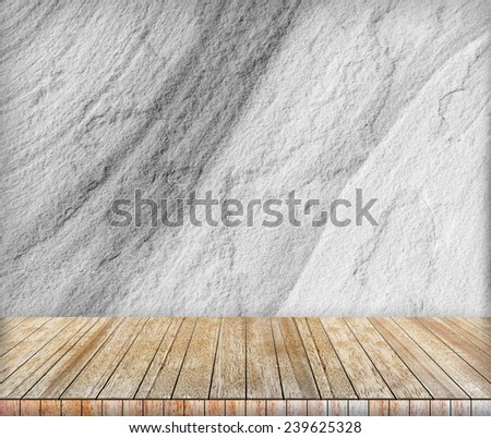 Backdrop sandstone wall and wood slabs arranged in perspective texture background in black and white.