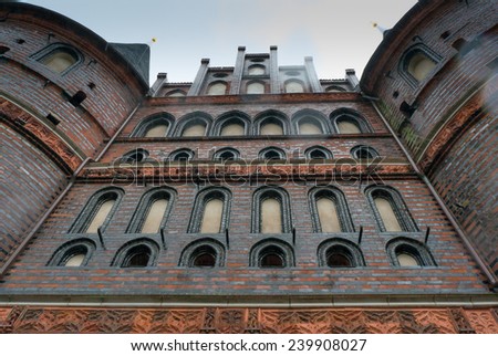 Holstentor or  Holsten Gate in  LÃ?Â¼beck germany,	The Holsten Gate is a city gate marking off the western boundary of the old center of the Hanseatic city of LÃ?Â¼beck germany