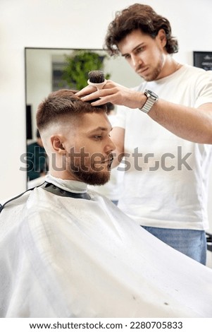 Similar – Image, Stock Photo Ethnic barber trimming mustache of client in hairdressing salon