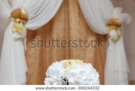 flowers at the wedding in the design of the room