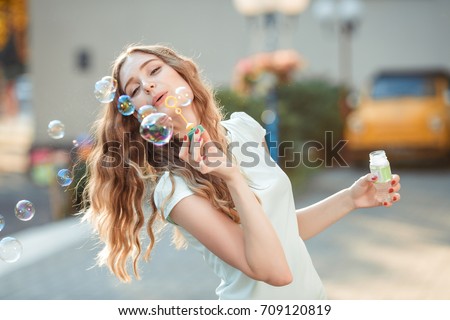 Similar – Foto Bild Fröhliche moderne Frau spielt Ukulele