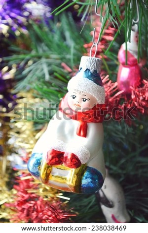 Christmas toy in the form of a girl, Christmas decorations, garland.Snow Maiden