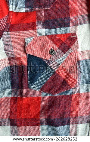 red checkered shirt pocket closeup