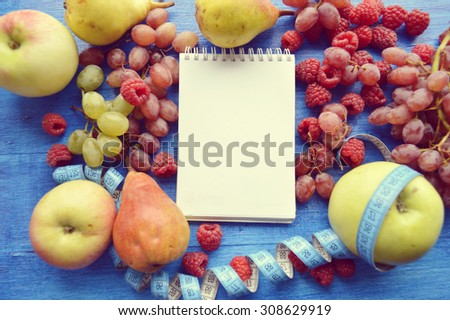 fruits for weight loss, a measuring tape, diet, weight loss, healthy eating, healthy lifestyle concept