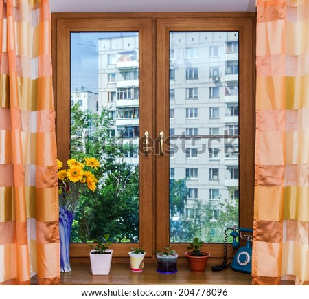 Oak veneer on the new window. City flat, Moscow.