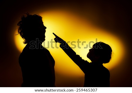 Two  expressive boy\'s silhouettes showing emotions using gesticulation, isolated on yellow