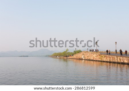 Hangzhou, China - April 12, 2015: Broken Bridge at West Lake Hangzhou, China. Broken Bridge is One of the Famous Scenic Sites at West Lake, also Called Xihu in Chinese.