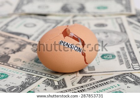 Broken Egg with Pension Tag Sitting on a Pile of Money