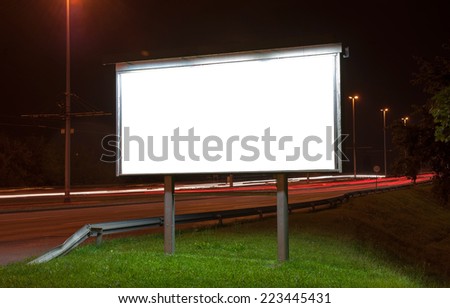 Billboard on highway by night in Zagreb