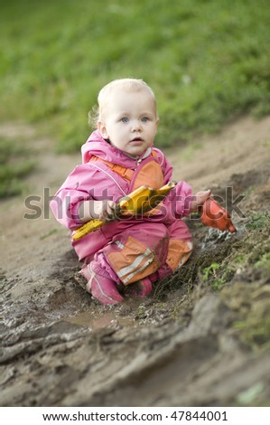 Child playing in Mud