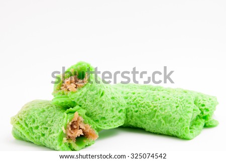 The moist grated coconut mixed with palm sugar as for the filling of Kueh Ketayap (kueh dadar/ sweet nyonya pancake roll).