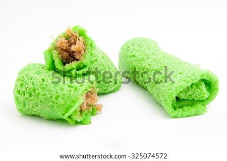 The moist grated coconut mixed with palm sugar as for the filling of Kueh Ketayap (kueh dadar/ sweet nyonya pancake roll).