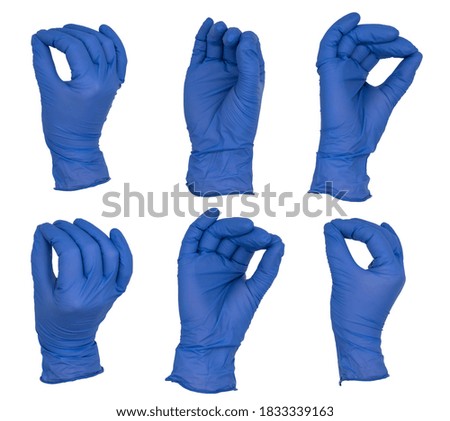Similar – Image, Stock Photo hands wearing blue gloves holding culture dish