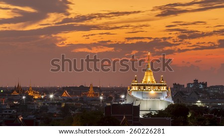 Golden Mount Temple Fair, Golden Mount Temple with red cloth in Bangkok at dusk (Wat Sraket, Thailand)