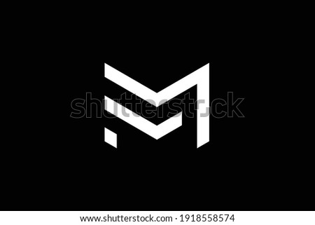 FM letter logo design on luxury background. MF monogram initials letter logo concept. FM icon design. MF elegant and Professional white color letter icon design on black background.