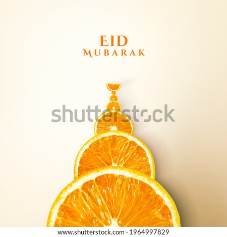 Orange Juice Eid Mubarak and Ramadan Creative Concept Design. Eid moon and Mosque made by Orange. Orange slice and juice glass isolate view. orange slice manipulation. Mosque shape citrus White space.