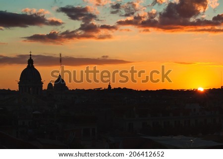 Sunset over cityscape of Rome, Italy.