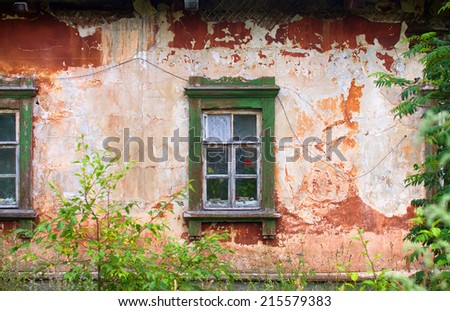 Old dirty wooden window on old house