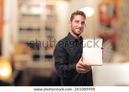 ginger young man with shirt with project