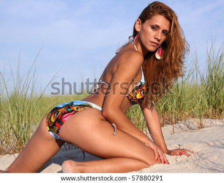 woman in sexy bikini in the dunes