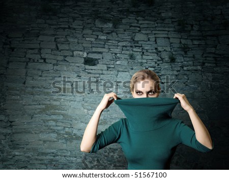 fashion ninja woman in old brick ruins