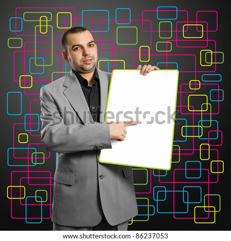 happy businesswoman holding blank white card in her hands