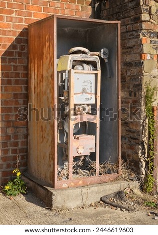 Similar – Image, Stock Photo Old dilapidated fuel pump for liquid fuel in detail with reflection of a blue oh so environmentally friendly xyz car