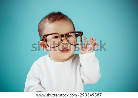 Little baby with Glasses, new family and love concept.