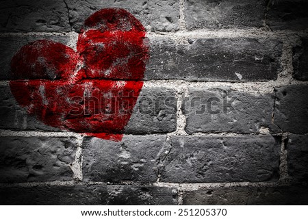 Painted Red Heart Shape on Black Brick Wall ( Background )