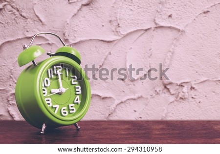 Clock on Wooden Floor with Cement Background , Vintage Style