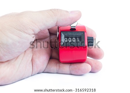 Hand hold red hand tally counter on white background